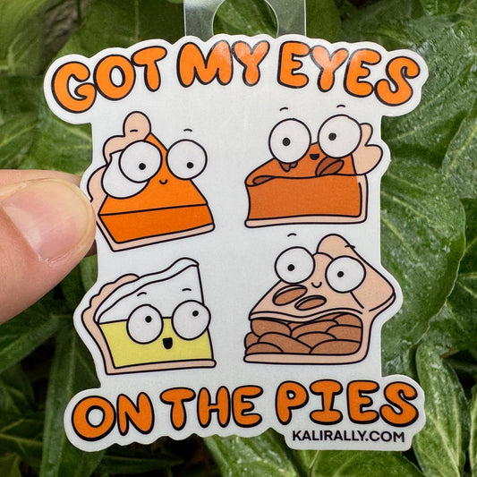 Thanksgiving Sticker by Kalirally featuring “Got My Eyes on the Pies” with pumpkin, pecan, lemon meringue, and apple pies, glossy vinyl water bottle sticker, perfect for laptops, bottles, notebooks, and gifts.