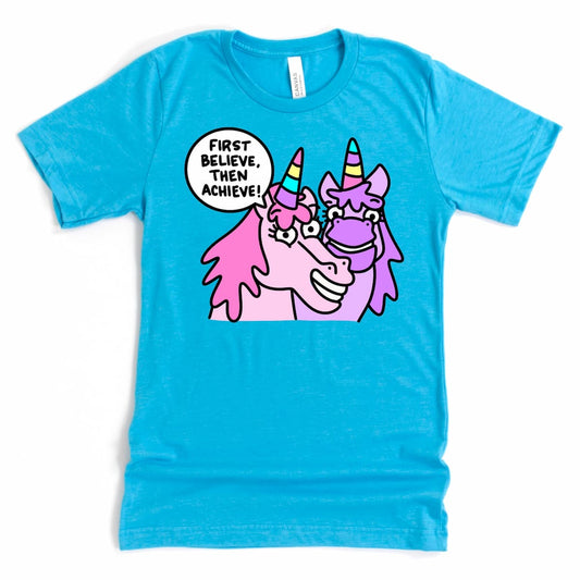 Inspiring unicorn shirt in Heather Aqua with “First Believe, Then Achieve.” cartoon unicorn design, by Kalirally