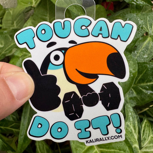 Motivational gym sticker with cartoon toucan lifting a barbell – Toucan do it design by Kalirally