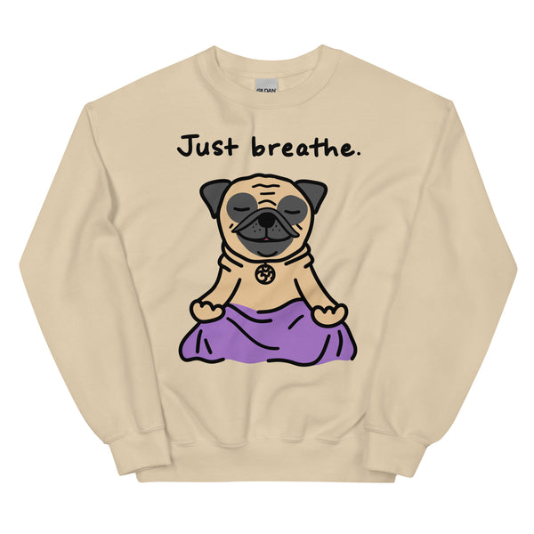 "Just Breathe Pug Sweatshirt featuring a cute cartoon pug in a sitting yoga pose. Cozy and perfect for pug lovers and yoga enthusiasts, available for wholesale and art licensing."