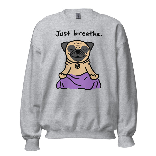 "Just Breathe Pug Sweatshirt featuring a cute cartoon pug in a sitting yoga pose. Cozy and perfect for pug lovers and yoga enthusiasts, available for wholesale and art licensing."